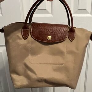 Long champ bag, good for day or night, running errands, great use for anything.